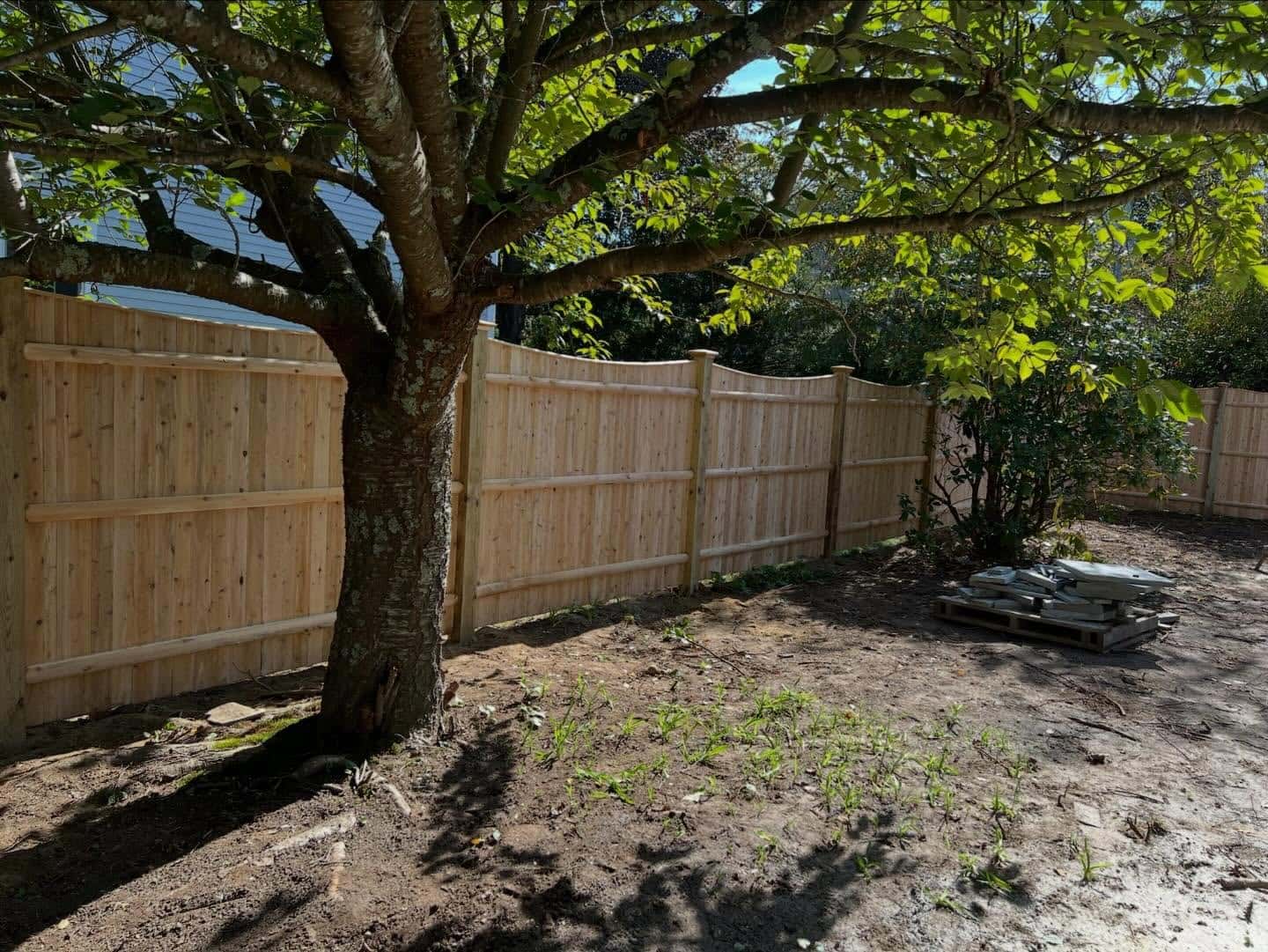 Wood fence installation in Wellesley, Massachusetts